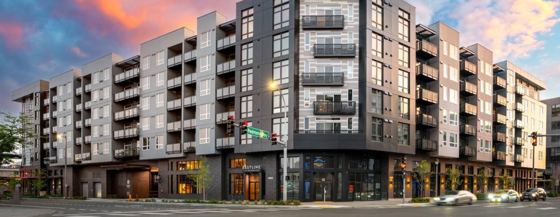 Modern luxury apartment complex Eastline Redmond with large windows, private balconies, and located at Redmond Way.